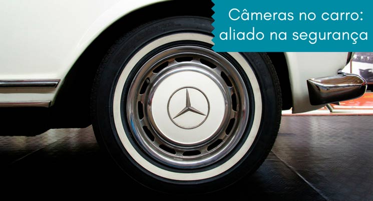 Imagem de um pneu com a legenda "cameras no carro: aliado na segurança"