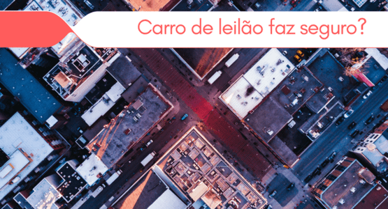 imagem de uma cidade vista por cima com a legenda: carro de leilão faz seguro?